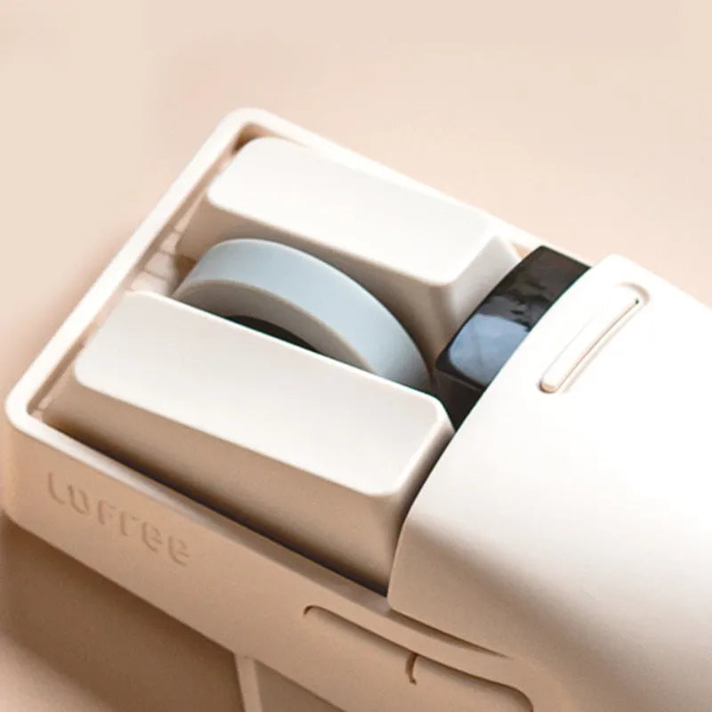 Xiaoqiao Tofu coloured wireless mouse with seven buttons and four way roller on mouse pad