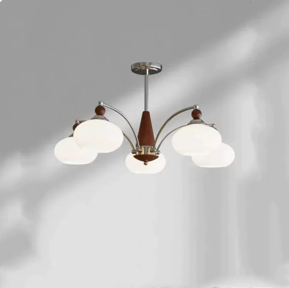 Persimmon glass and chrome chandelier with multiple lampshades in a Middle Ancient style
