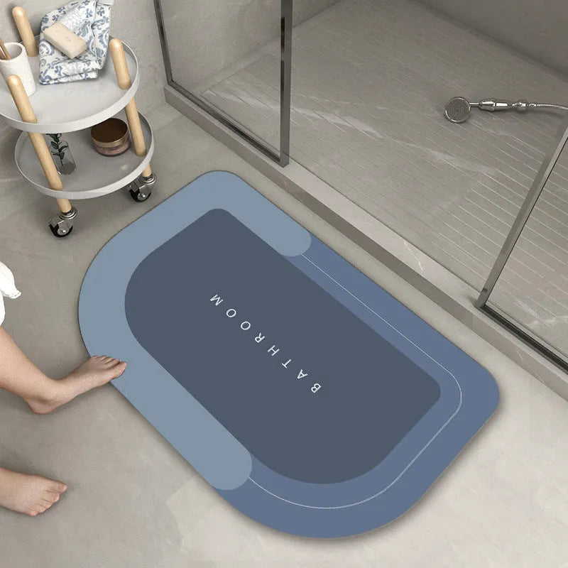 Blended fabric floor mat in an oval shape on a bathroom floor, available in multiple colours and sizes.