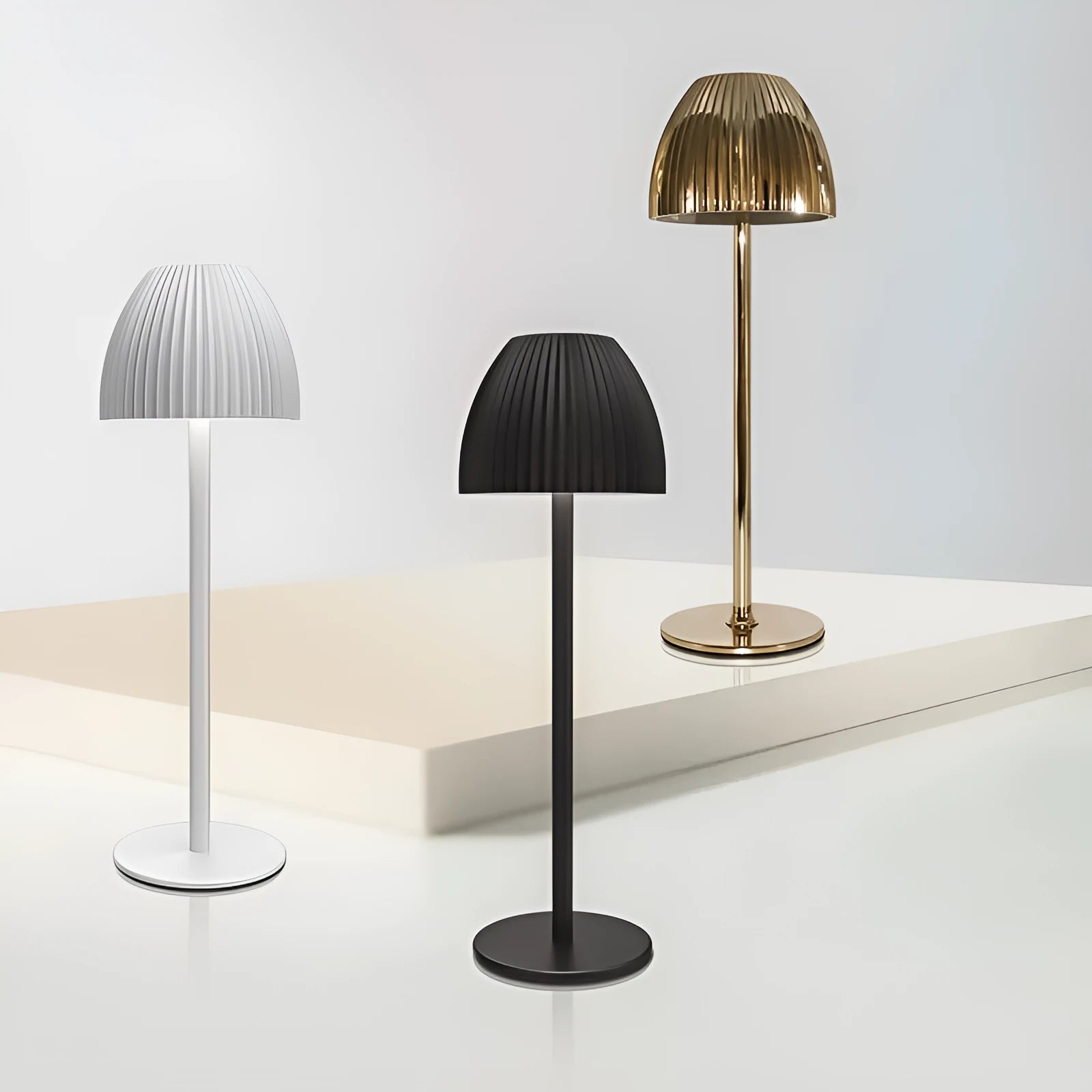 Modern minimalist LED table lamp with thin round base in black or white colour