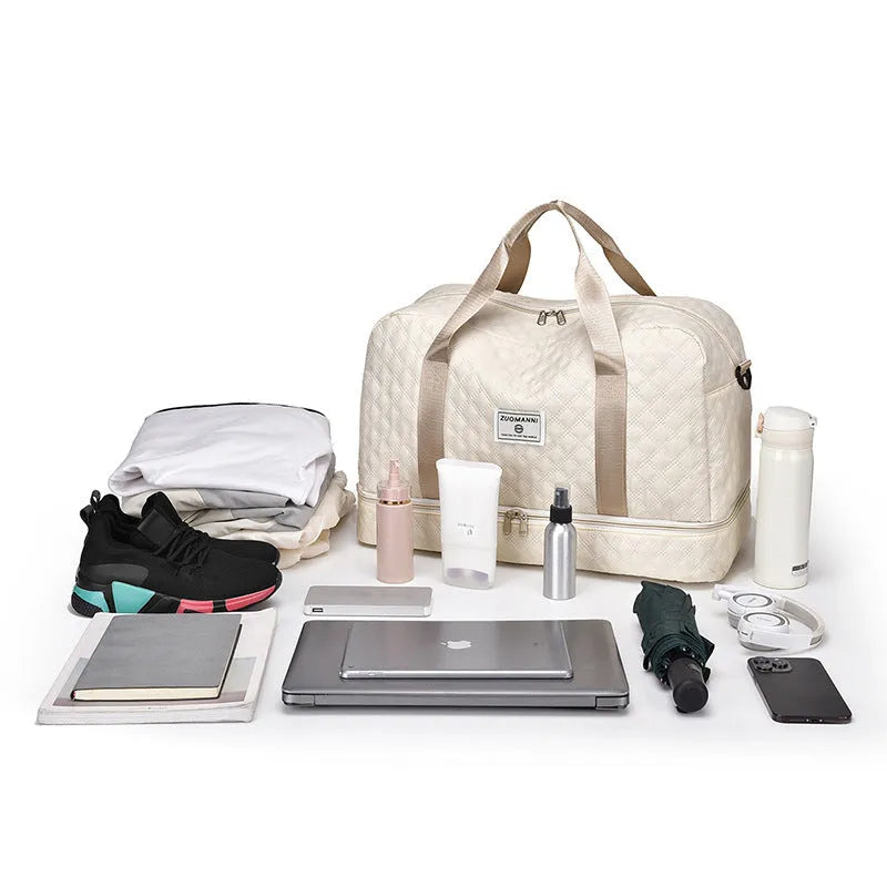 Large Oxford cloth leisure travel bag in a solid colour with sewing thread detail, shown in a 36-55L capacity size.