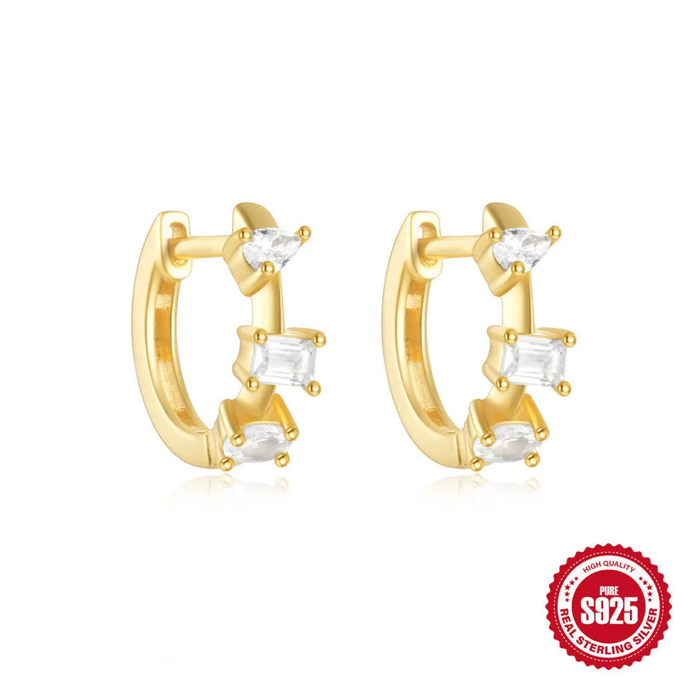 Sterling silver geometric stud earrings with small round designs in gold or silver electroplated finishes