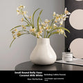 Black ceramic round belly French design vase with two white orchid flowers