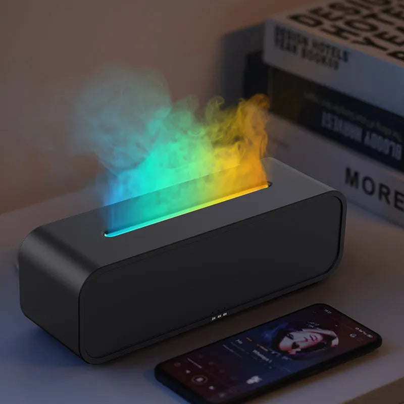 Black and white flame dynamic aroma diffuser with remote control on wooden table