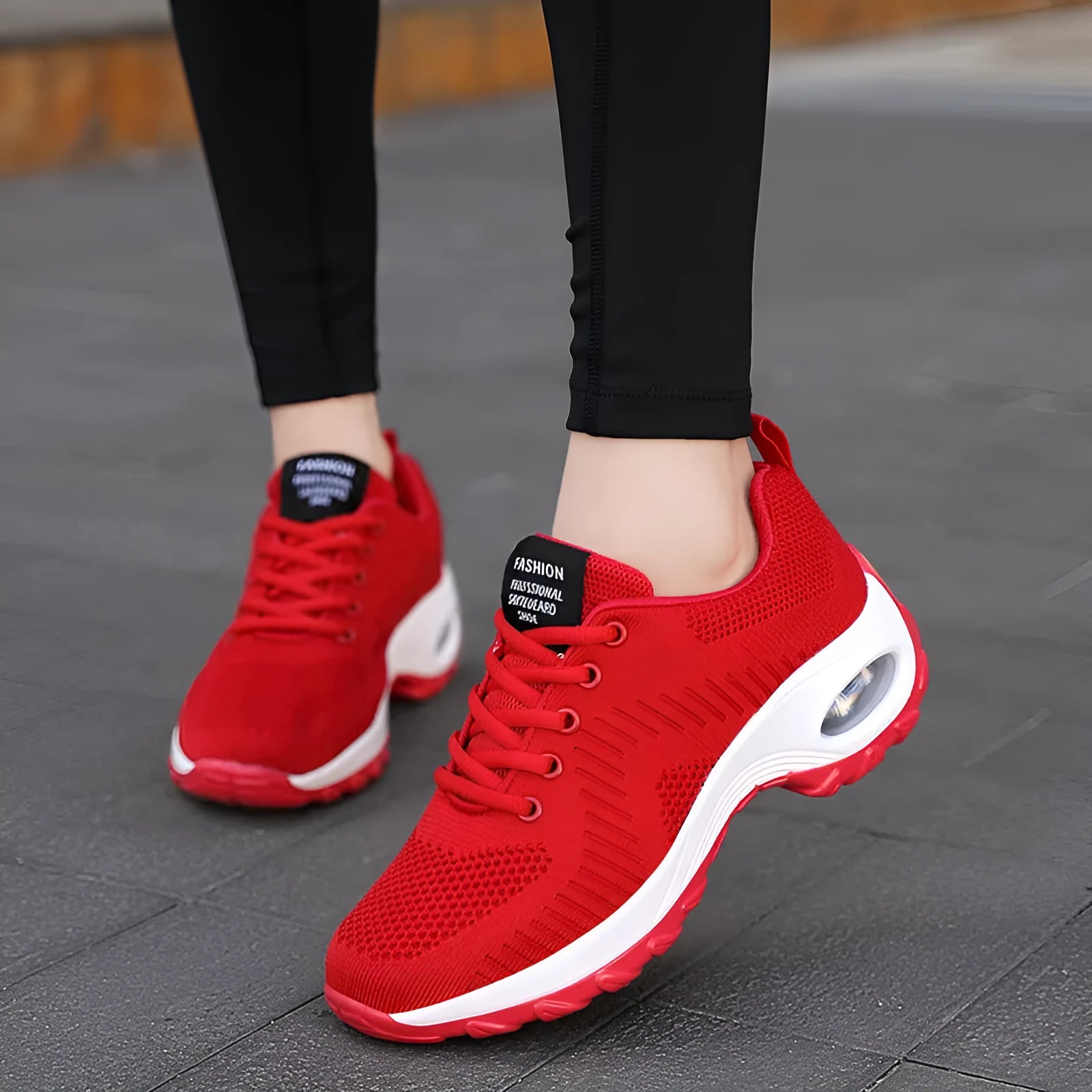 Red and black women's mesh sneakers with front lace-up and round toe on flat PU sole