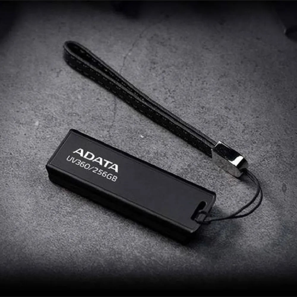 Black car mounted USB flash drive with compact dimensions showing waterproof flexible design