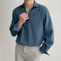 Men's loose fit lapel casual shirt in a solid colour with long sleeves.