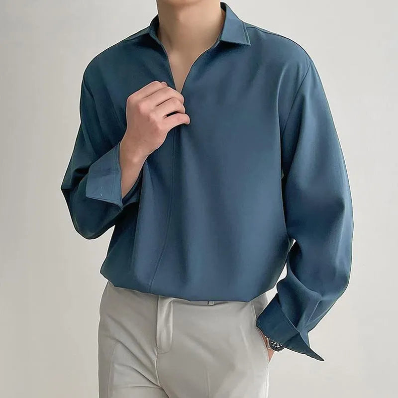 Men's loose fit lapel casual shirt in a solid colour with long sleeves.
