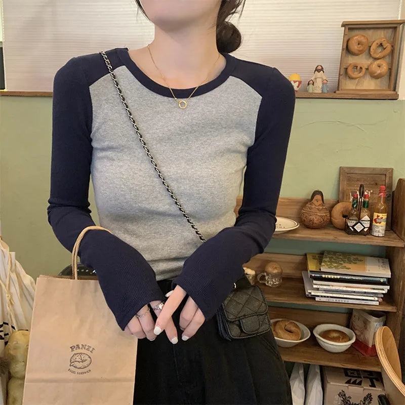 Women's slim fit viscose top with princess sleeves and embroidery detailing in dark blue colour