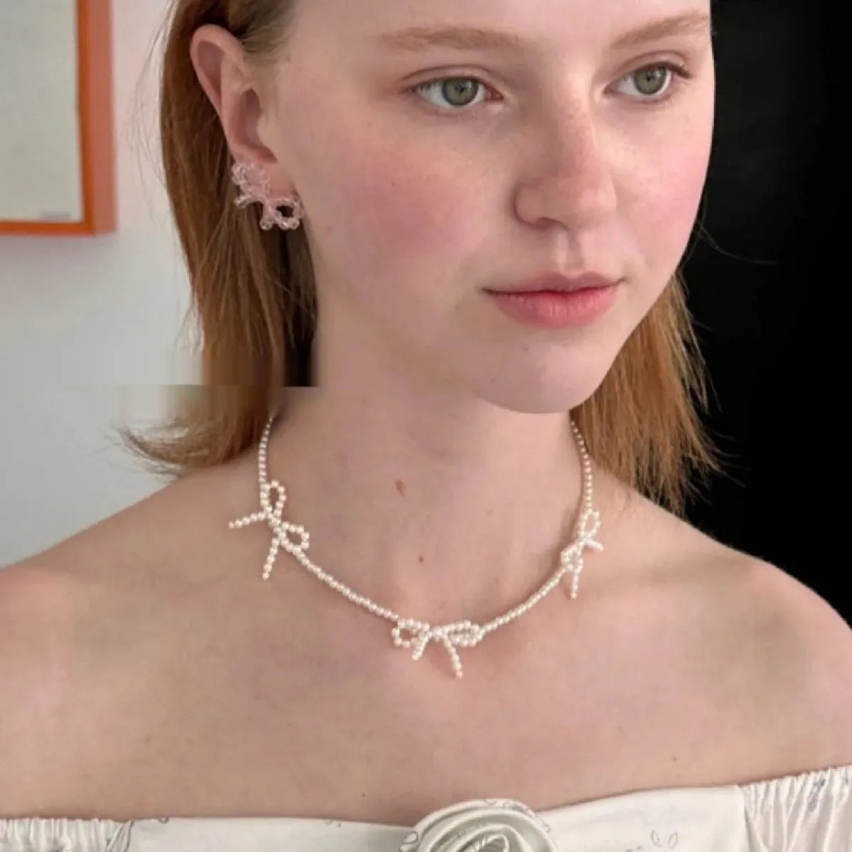 Sweet bow pearl necklace with geometric charm on adjustable 31-40cm chain