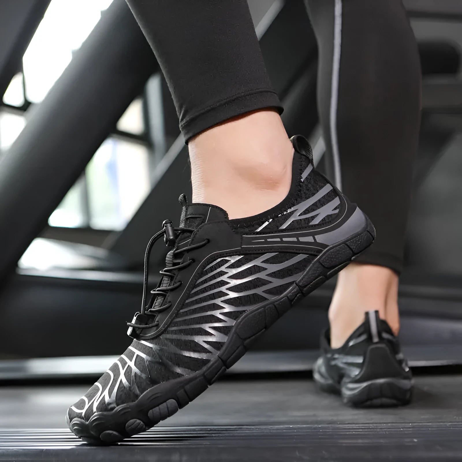 White and pink lace-up sports shoes with a breathable gauze lining and textured rubber outsole.