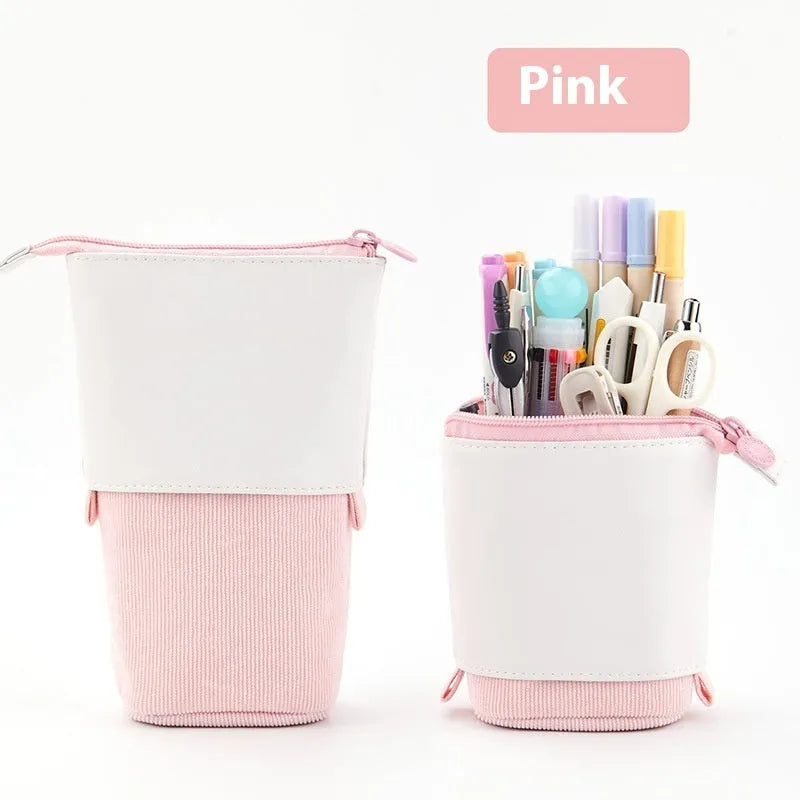 Corduroy drop-down telescopic stationery case in six colour options on a desk