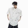 Men's loose-fit casual summer shirt with spliced design details and lapel collar