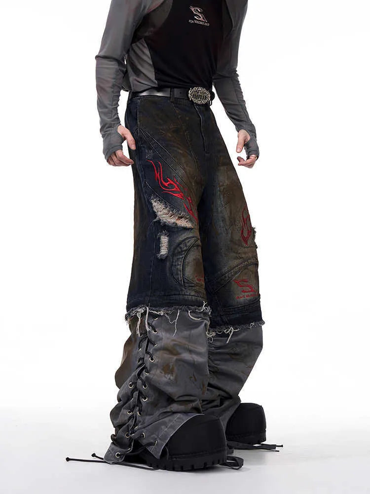 Men's wide-leg retro denim jeans with detachable trouser legs in a loose fit with a mid-high waist.