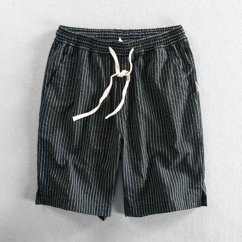 Men's striped cotton casual shorts showing straight-leg design and mid-waist fit
