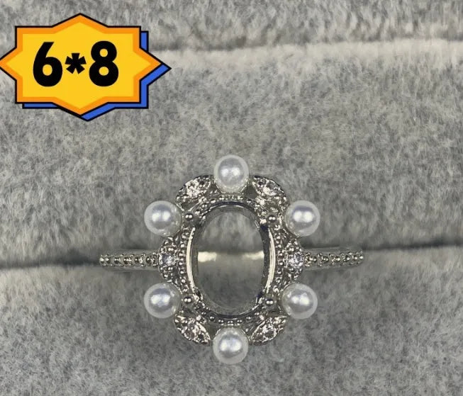 Copper oval denier ring with a 6x8 mm five-pointed star and open mouth setting.