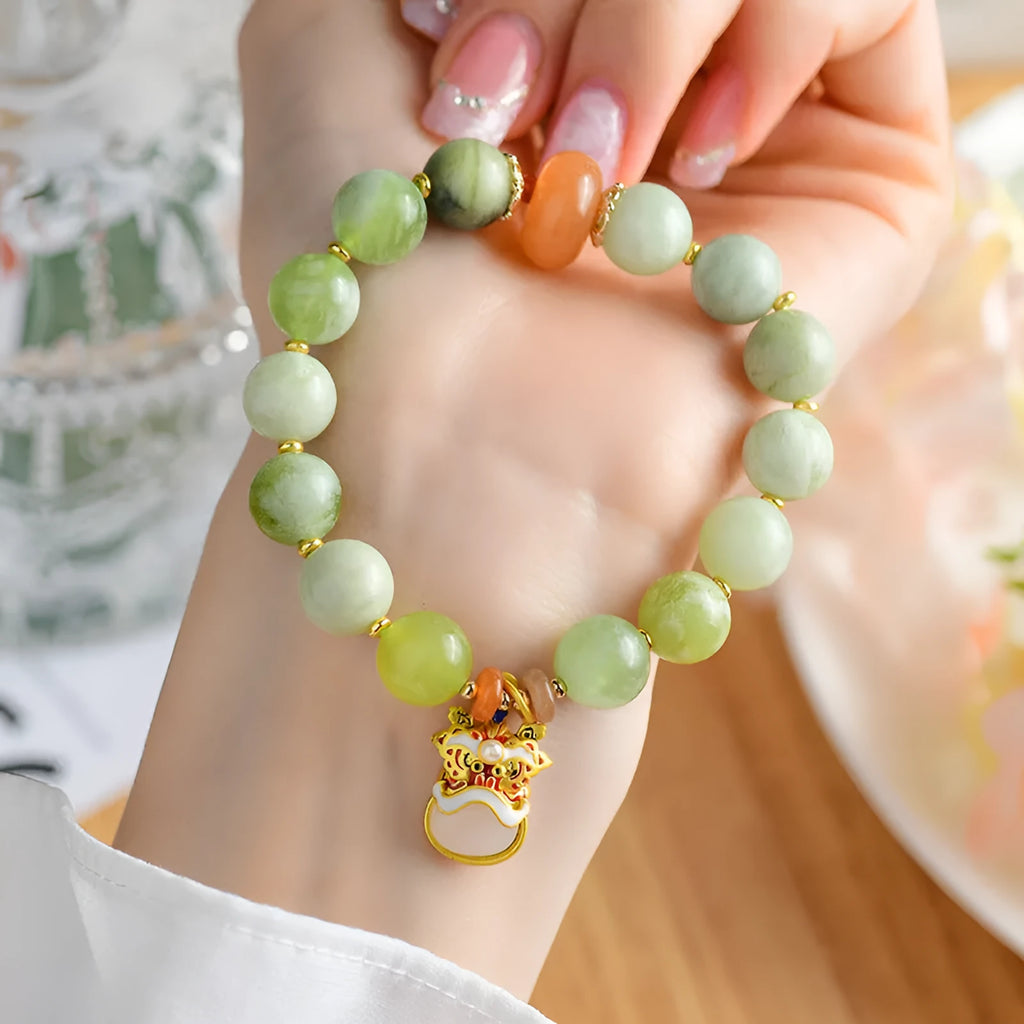 Handmade green milk-in-water jade bracelet with 10mm geometric retro beads for women.