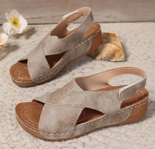 Roman-style women's platform sandals with an open toe and an adjustable Velcro ankle strap.