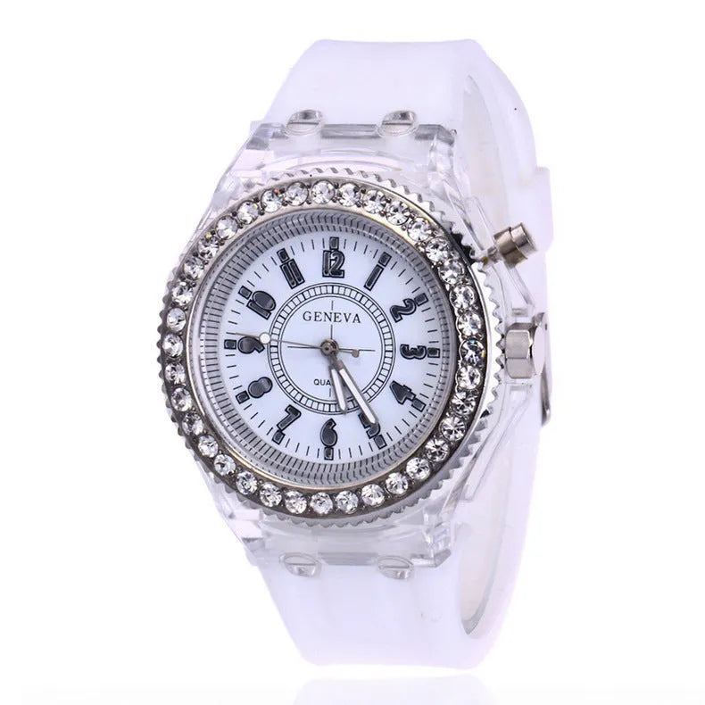 Women's LED luminous quartz watch with round 43mm alloy case and colourful silicone strap options.