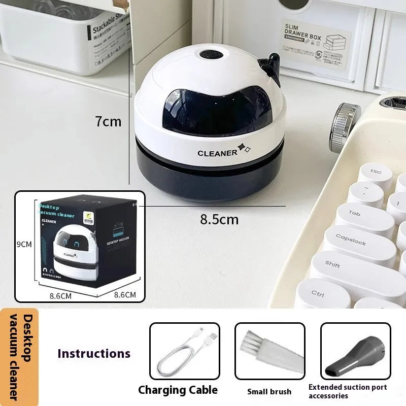 USB desktop vacuum cleaner in blue rocket design for keyboard and desk cleaning