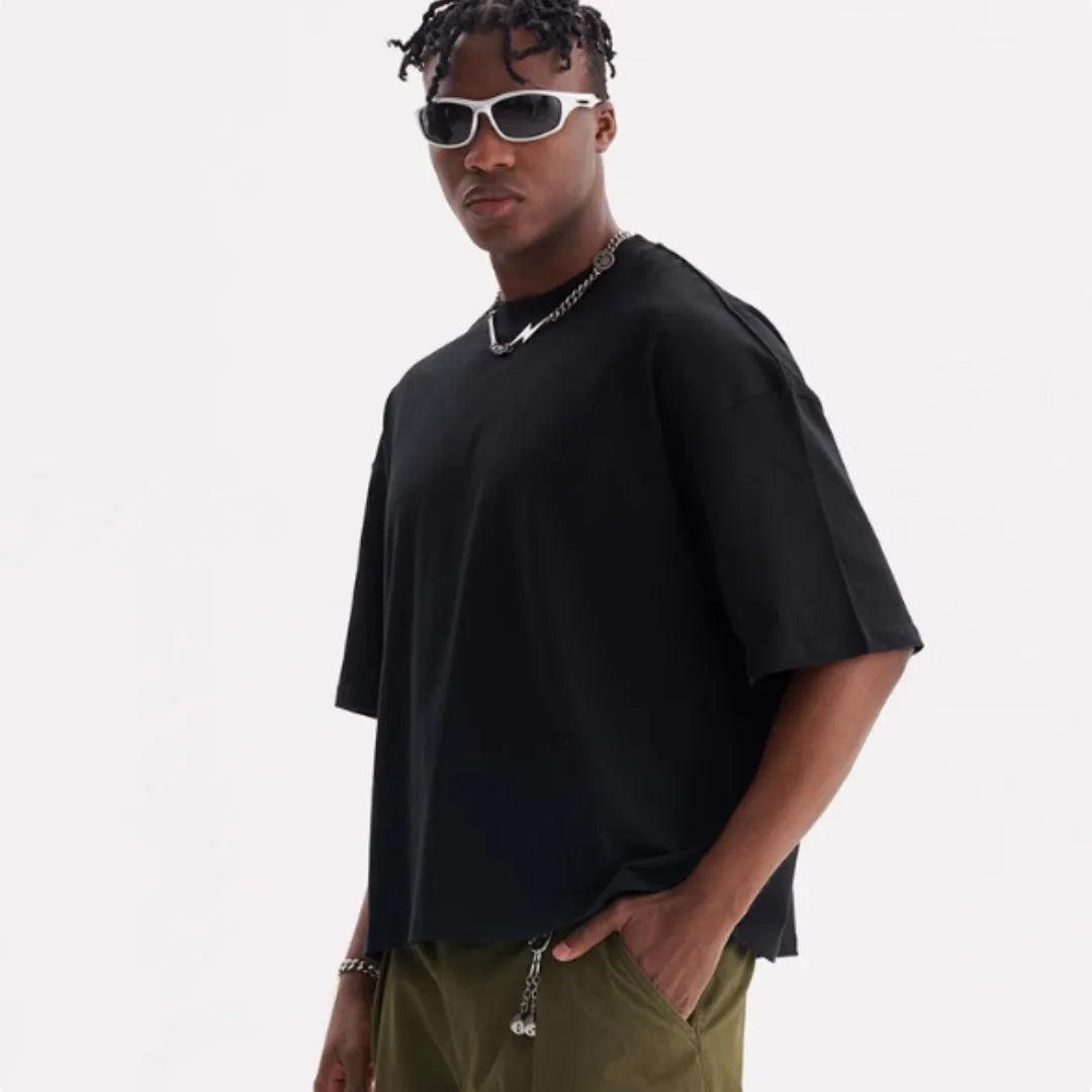 Men's loose fit pure cotton T-shirt in apricot colour on a hanger