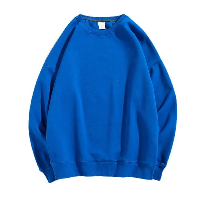 A loose round neck off shoulder pullover sweater in a solid colour, with long sleeves.