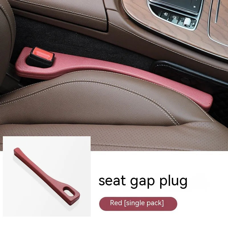 Car seat gap strips preventing items falling between vehicle seats