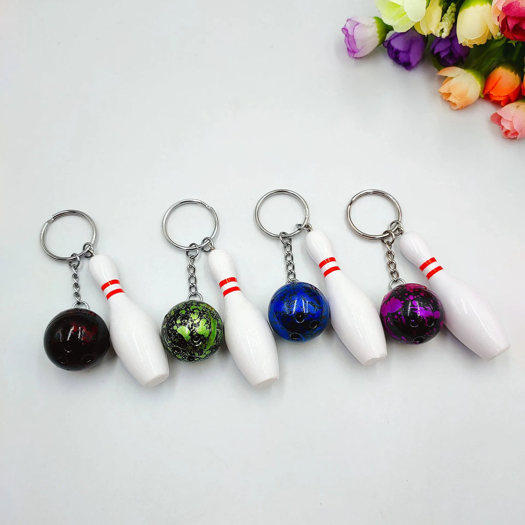 Mini bowling ball keychain pendant in blue colour with metal ring