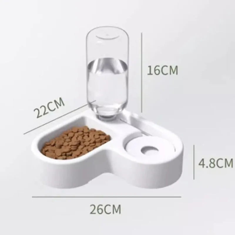 White automatic pet water fountain with stainless steel top on a floor.