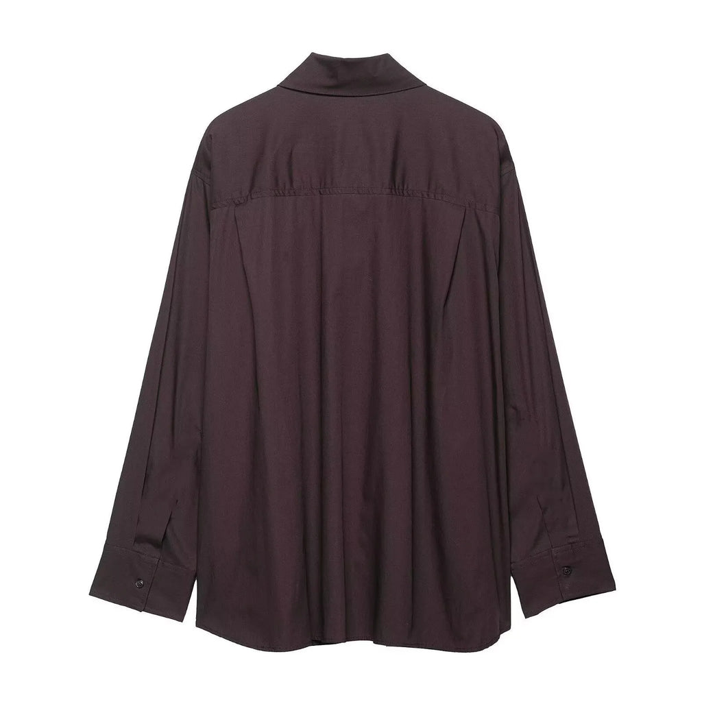 Brown women's poplin shirt with a bow tie, cardigan-style front, and long sleeves.