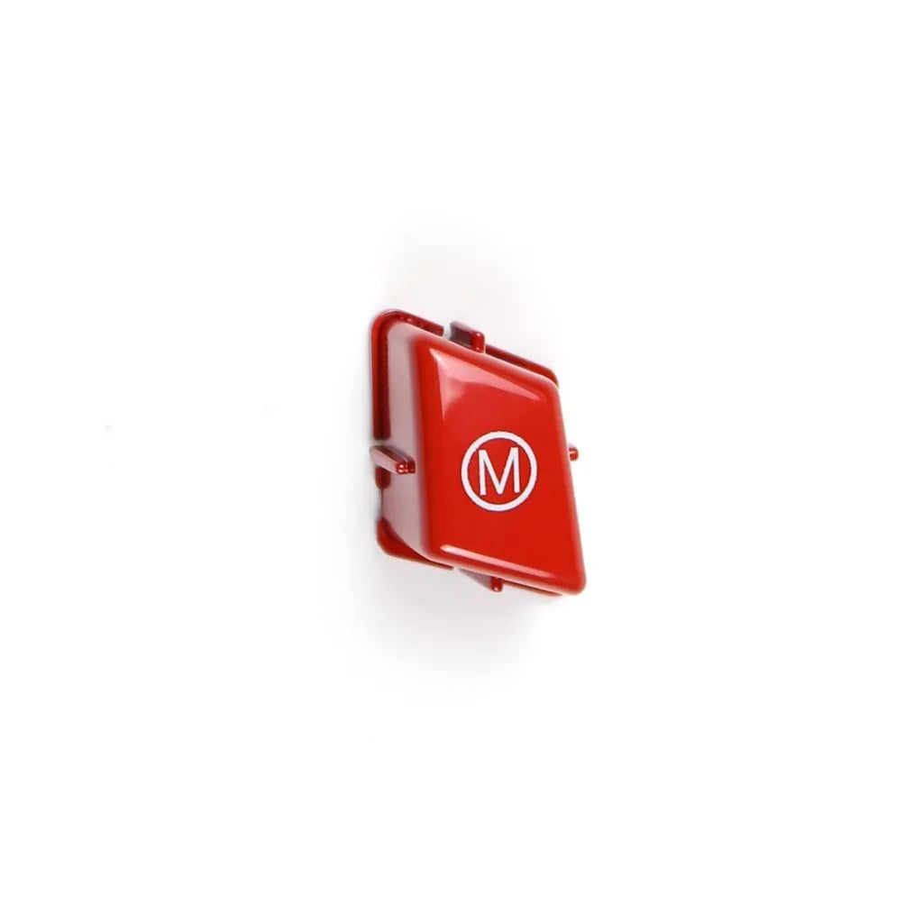 Pair of red and blue BMW M1 M2 steering wheel mode buttons with installation keys on a plain background.