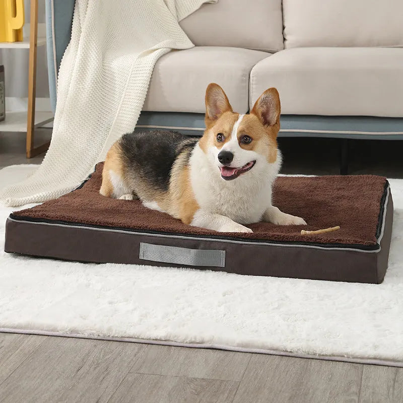 Removable washable sponge dog mat in brown, available in multiple sizes on a wooden floor.