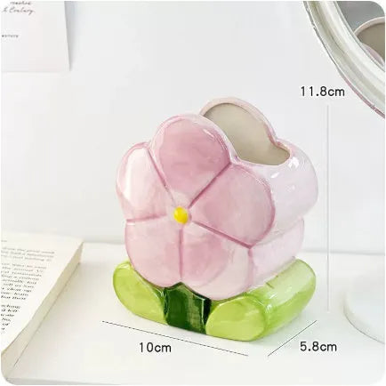Ceramic flower pen holder storage box with floral pattern on desktop