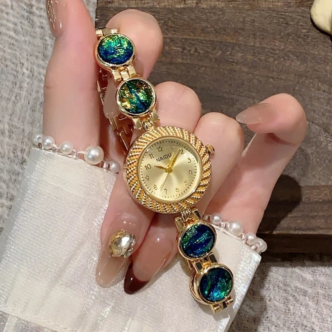 Women's 25mm round quartz watch in zinc alloy case showing six colour options
