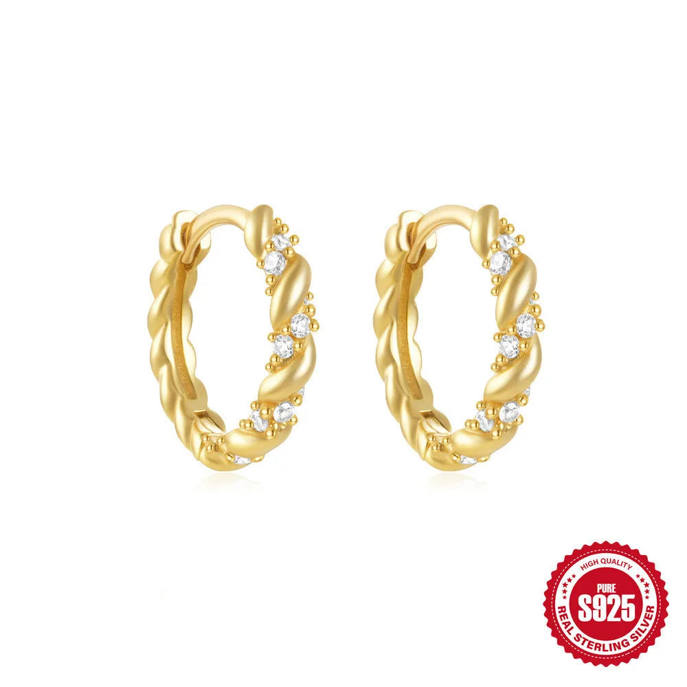 Sterling silver geometric stud earrings with small round designs in gold or silver electroplated finishes