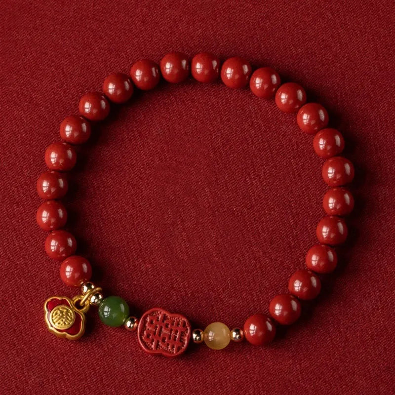 Cinnabar bracelet with fu character in Emperor Sandstone colour, showing 6mm and 8mm bead size options.