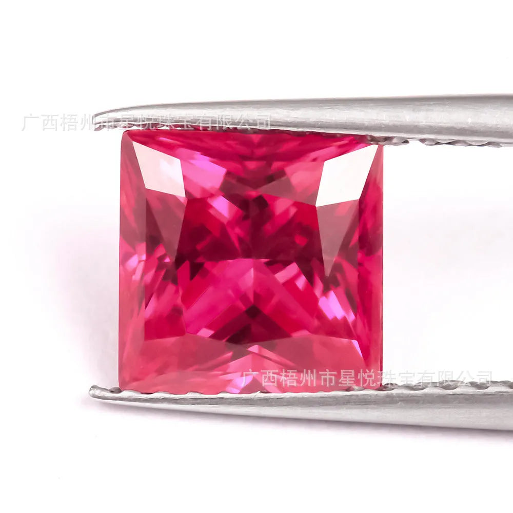 Artificial pigeon blood red ruby gemstone in various cuts: egg, round, princess, water drop, grandmother, and Asche.