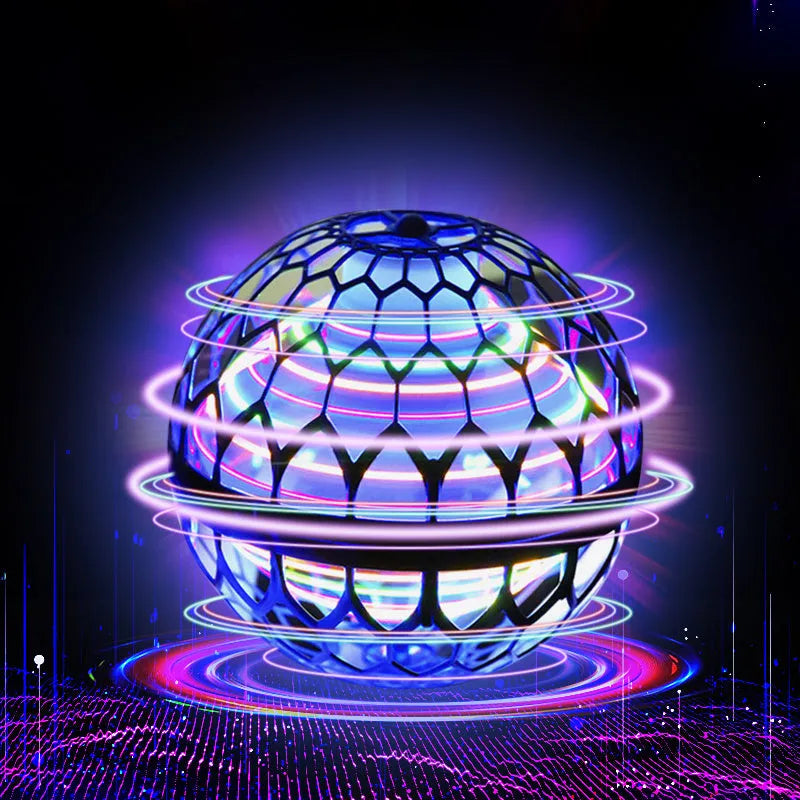 Blue spinning flying ball toy with LED lights hovering above a child's hand next to a magic wand.