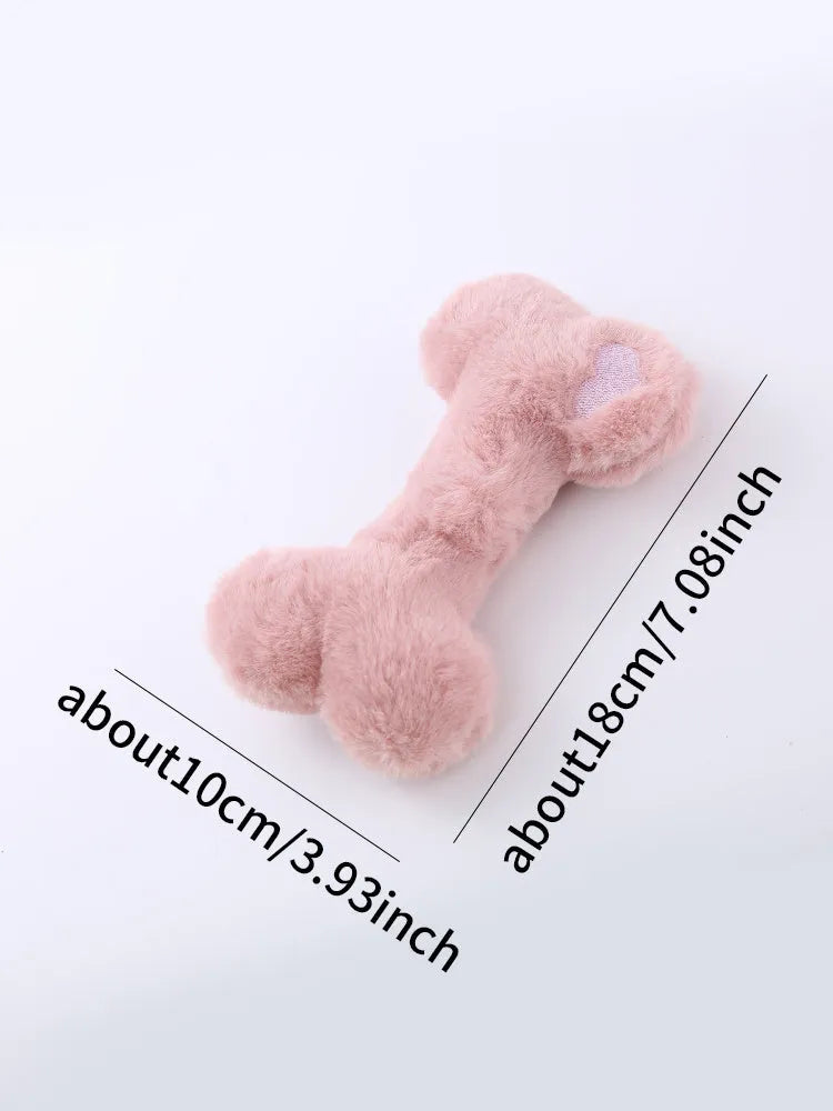 Soft blue plush love bone dog toy with a squeaker for interactive play.