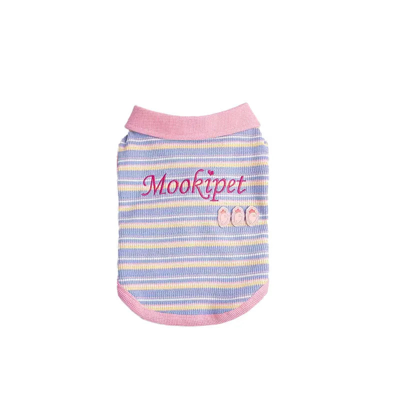 Pink purple sleeveless dog vest with a knitted turtleneck collar laid flat.