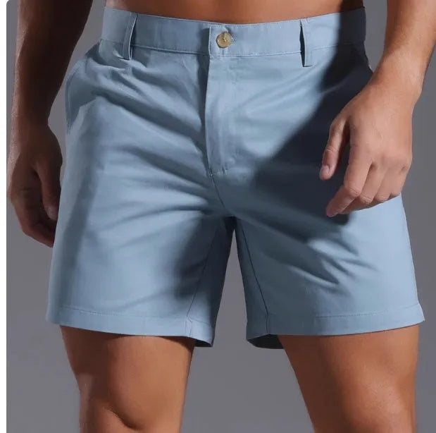 Men's straight-leg casual sports shorts in a solid colour, made from cotton blend fabric