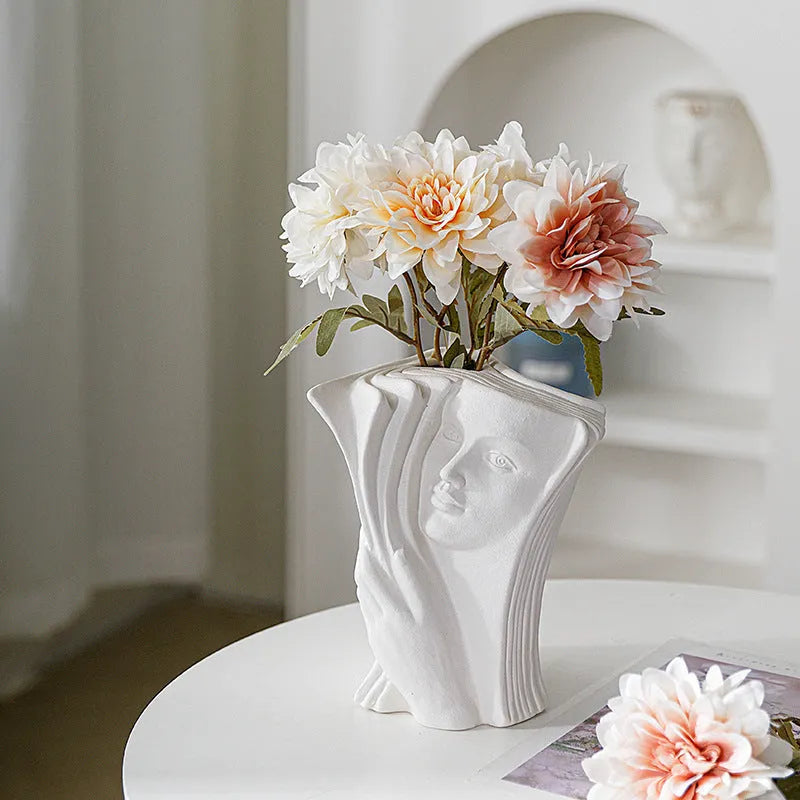 Ceramic book stand with glazed finish in decorative design for desktop storage