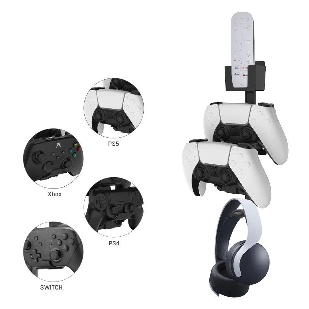White self-adhesive wall hook holding a black gaming controller and headset.