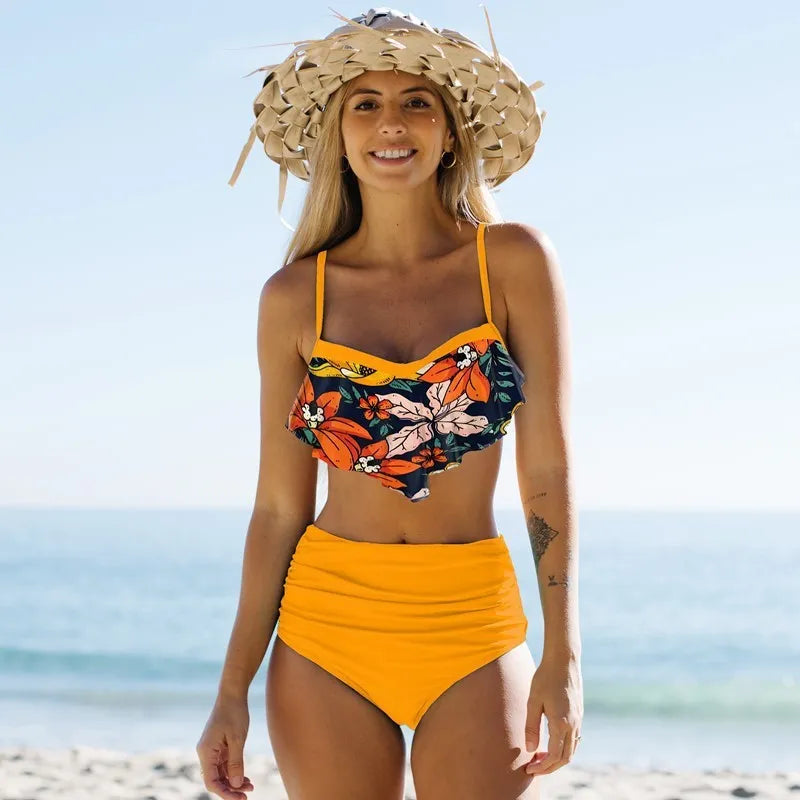 Blue floral high-waisted pleated bikini swimsuit for women, showing brief top and pants.