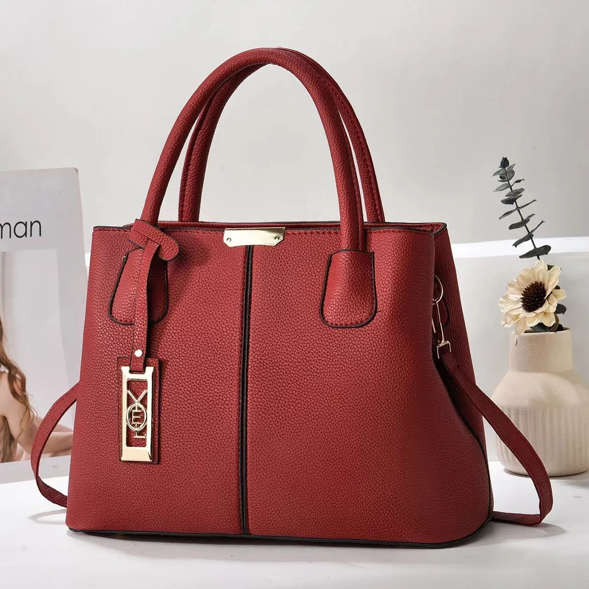Soft PU women's shoulder bag in horizontal square shape with leather strap, available in multiple colours