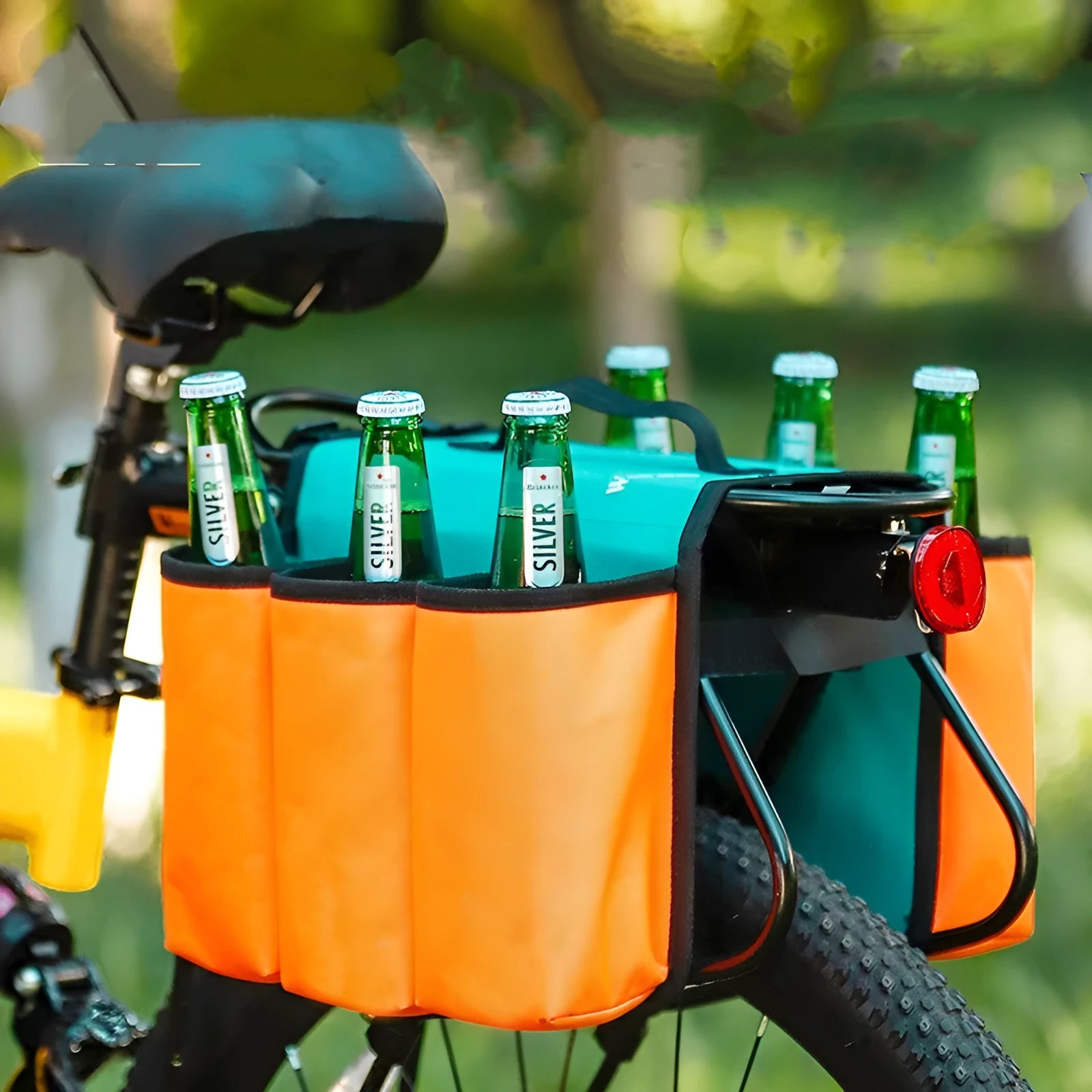 Black and blue orange double-sided bicycle drink bag with 2 litre capacity mounted on a bike frame