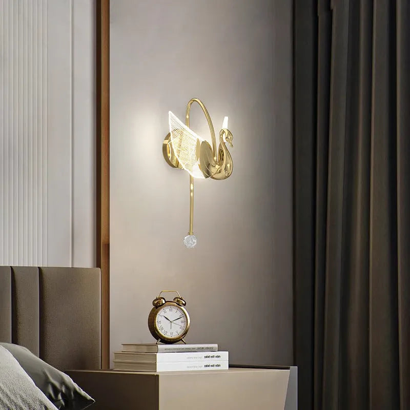 Gold minimalist swan wall lamp with iron construction and acrylic shade for bedside lighting
