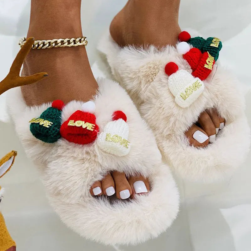 Adult Christmas hat decoration slippers in faux plush with rubber sole.