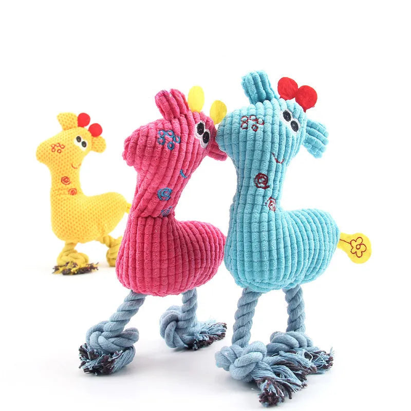 Blue deer-shaped plush dog toy with corn grain texture lying on a neutral background.