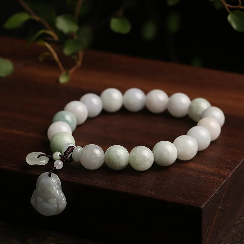 Natural green jade bracelet with hanging geometric charms including an Apple and a Maitreya Buddha pendant.